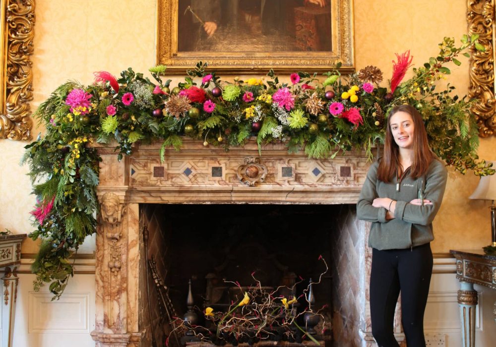 Liv Curtis Level 3 Floristry at fireplace