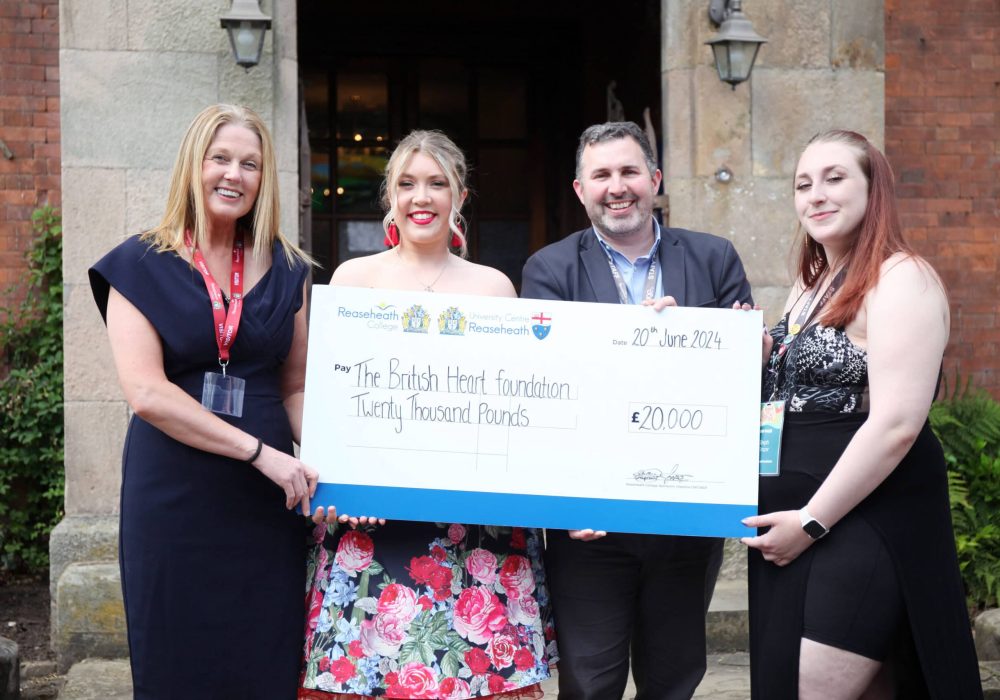 RAG cheque handover BHF's Hayley Gough, RAG Chair Sophie Connor, Senior Assistant Principal Paul Spearritt, SA President Steph Frazer