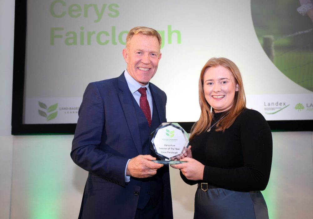 Reaseheath College student Cerys Fairclough with Adam Henson at Land-based and environment learner awards 2023