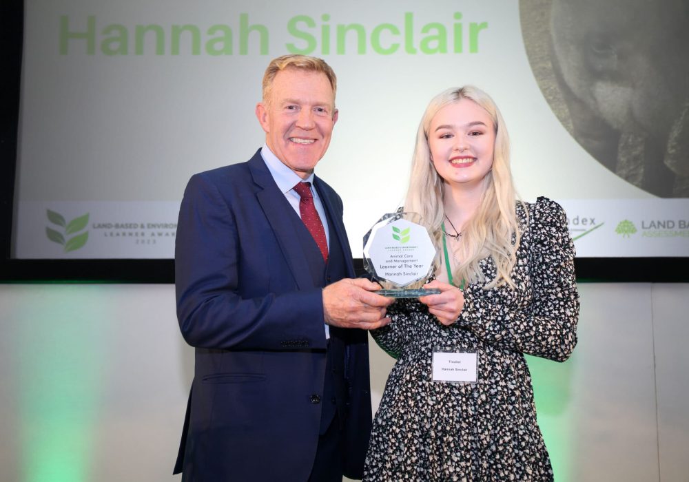 UCR graduate Hannah Sinclair with Adam Henson at Land-based and environment learner awards 2023